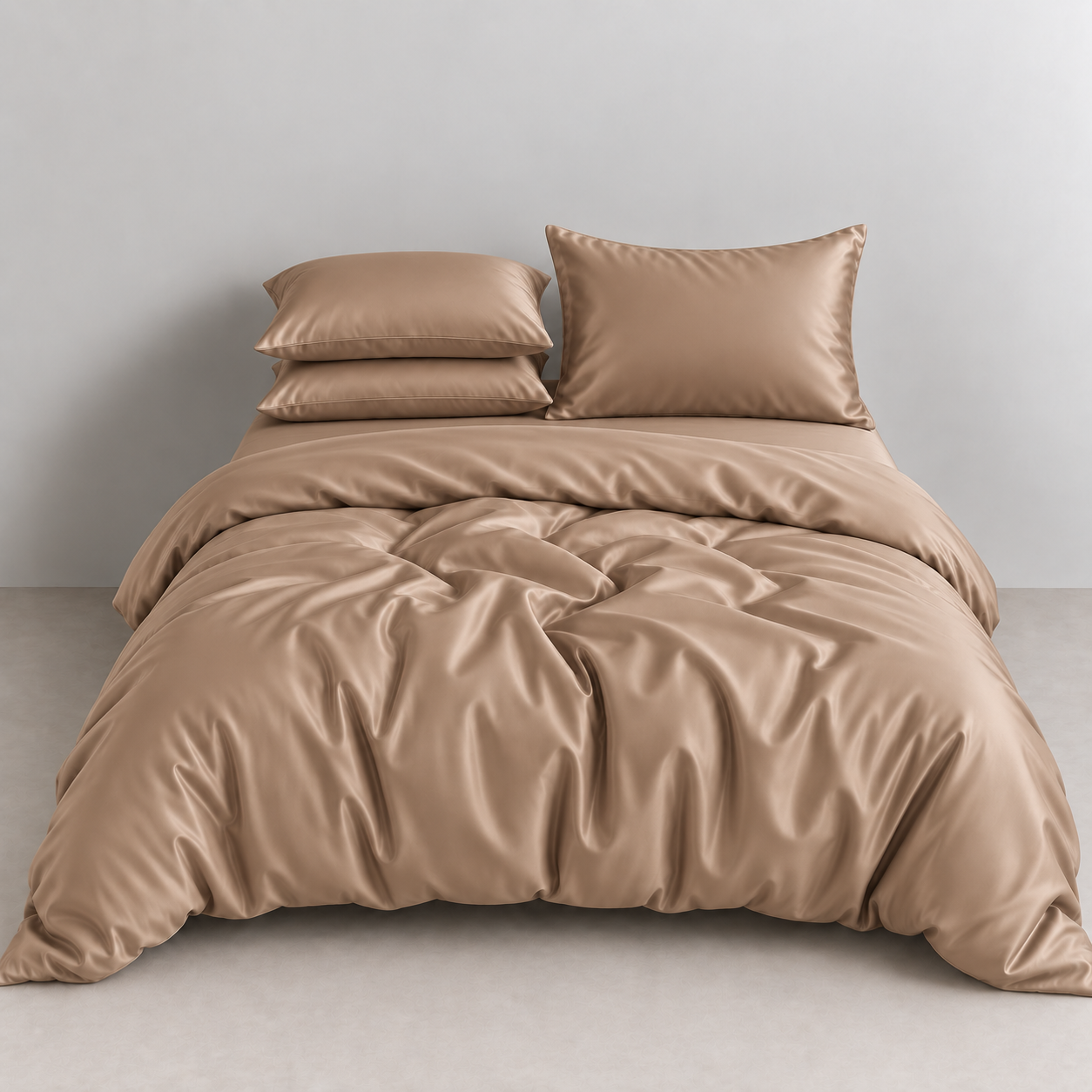 Amélie Bedding Set in Sandstone, sateen quilt cover and pillowcases with soft draped sheen on a bed