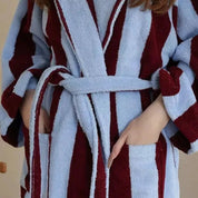 Bambi Striped Bath Robe worn belted, close-up of thick cotton terry in sky blue and wine stripes