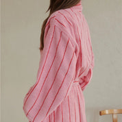 Bambi Striped Bath Robe worn, side view showing pink terry cotton with red pinstripes