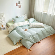 Blossom Bow Bedding Set in Mint, low platform bed with striped quilt cover and bow tied corners
