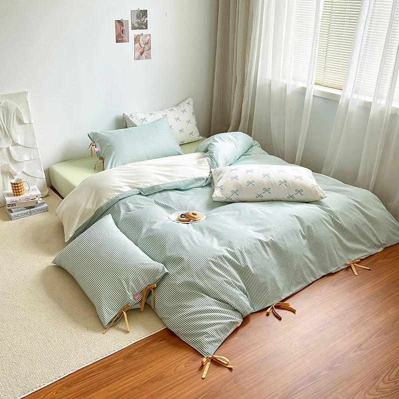 Blossom Bow Bedding Set in Mint, low platform bed with striped quilt cover and bow tied corners