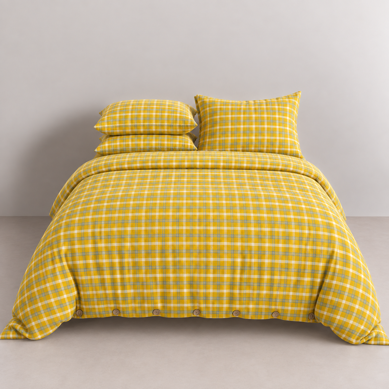 Calla Check Bedding Set in Marigold, made bed with tat check quilt cover and button-up closure, studio shot