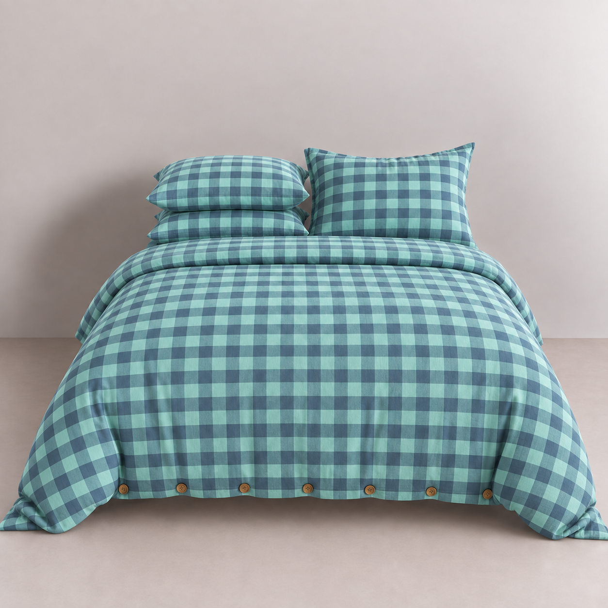 Calla Check Bedding Set in Seafoam, made bed with green and navy check quilt cover and button closure