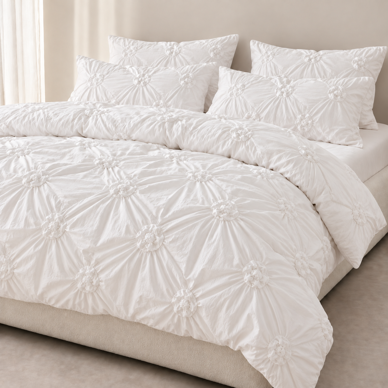 Camila Bedding Set in Ivory, rosette textured quilt cover and pillowcases styled on a made bed