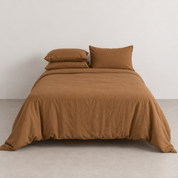 Coastal Washed Bedding Set in Toffee Beige, made bed showing crinkled pre-washed cotton texture