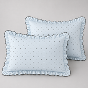 Two pillowcases from the Elsie Spot Bedding Set in Cloud Blue, fine spot print with gathered frill edge
