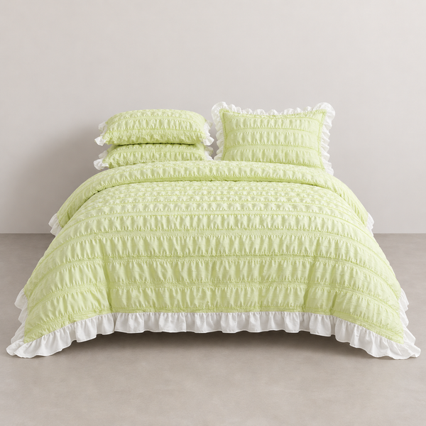 Esmé Ruffle Bedding Set in Lime, made bed with ruched texture and white frill edging