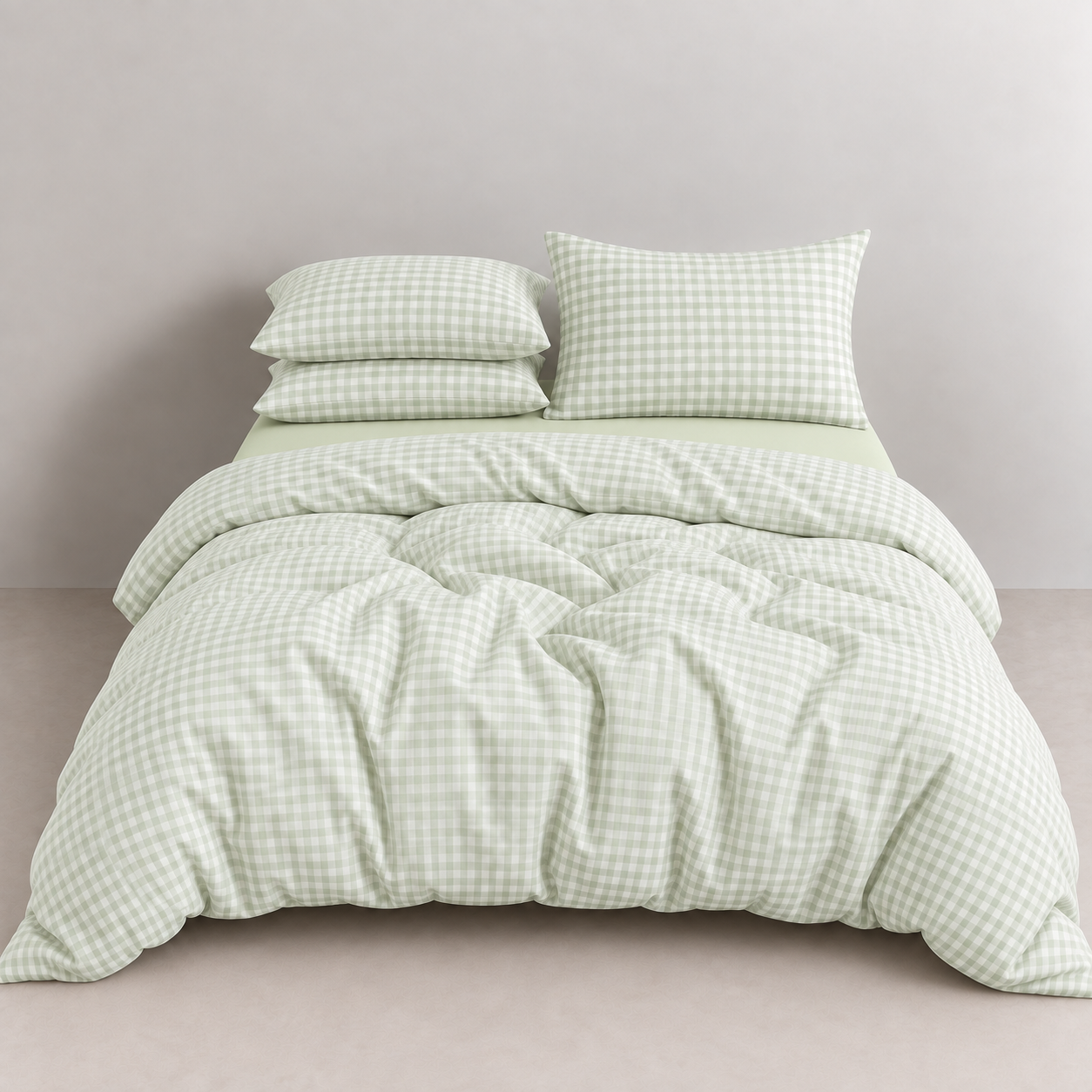 Honeythatch Gingham Bedding Set in Mint Cream, a made bed with checked quilt cover and pillowcases