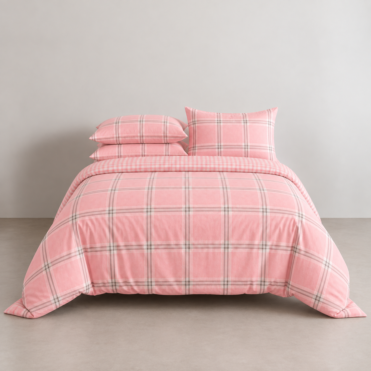 Kyoto Plaid Bedding Set in Cherry Milk, pink check quilt cover and pillowcases on a made bed