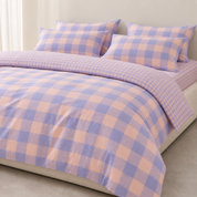 Kyoto Plaid Bedding Set in Lavender Haze, made bed with lavender and peach check quilt cover and pillowcases