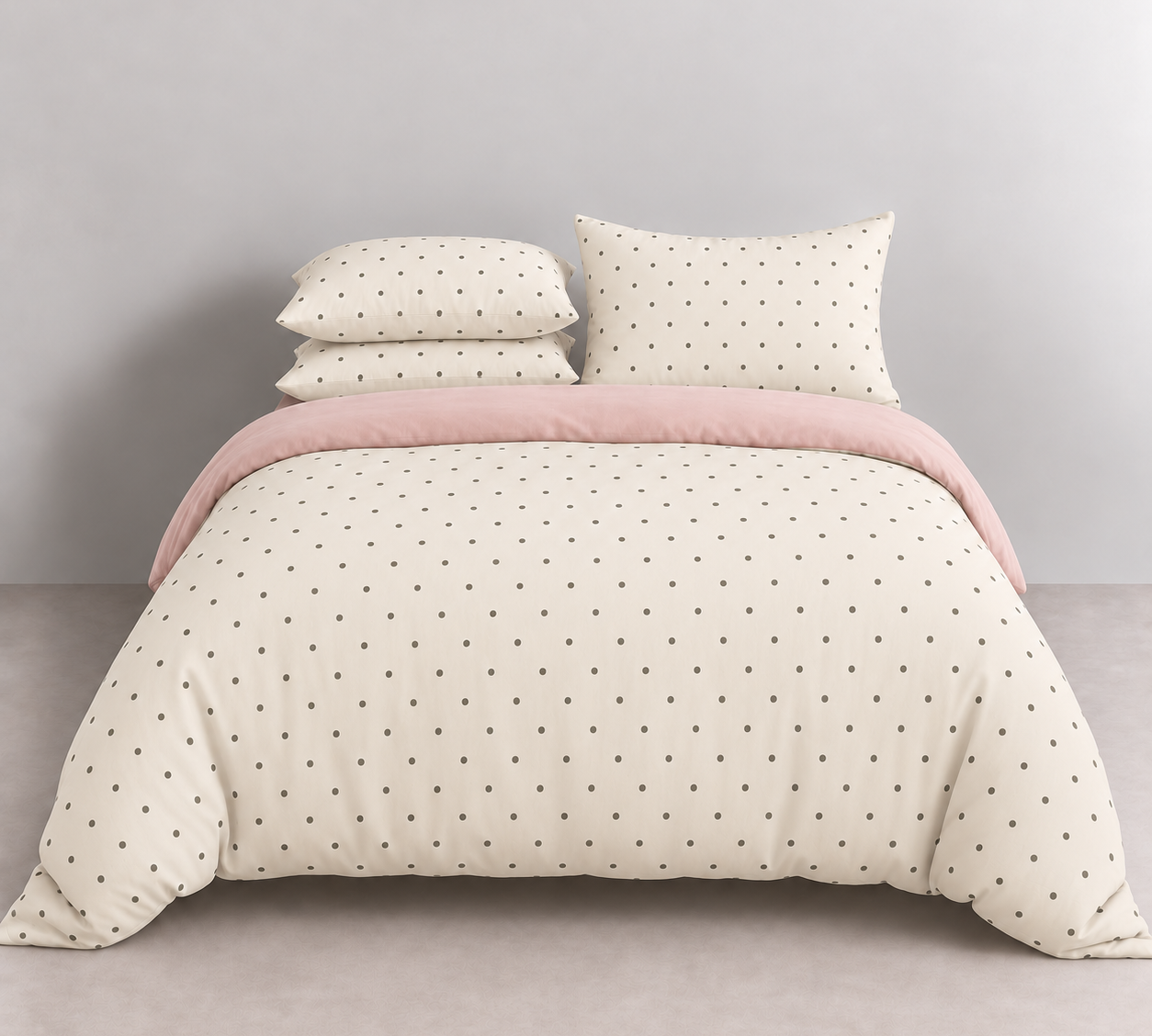 Lenny Spot Bedding Set in Cream & Blush Polka, made bed with blush pink quilt cover fold reveal