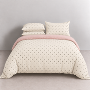 Lenny Spot Bedding Set in Cream & Blush Polka, made bed with blush pink quilt cover fold reveal