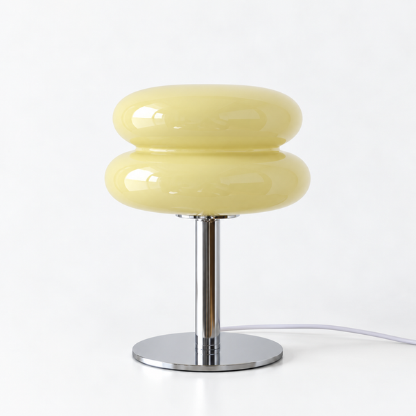 Macaron Lamp in Lemon, glossy stacked glass shade on a chrome base against a plain background
