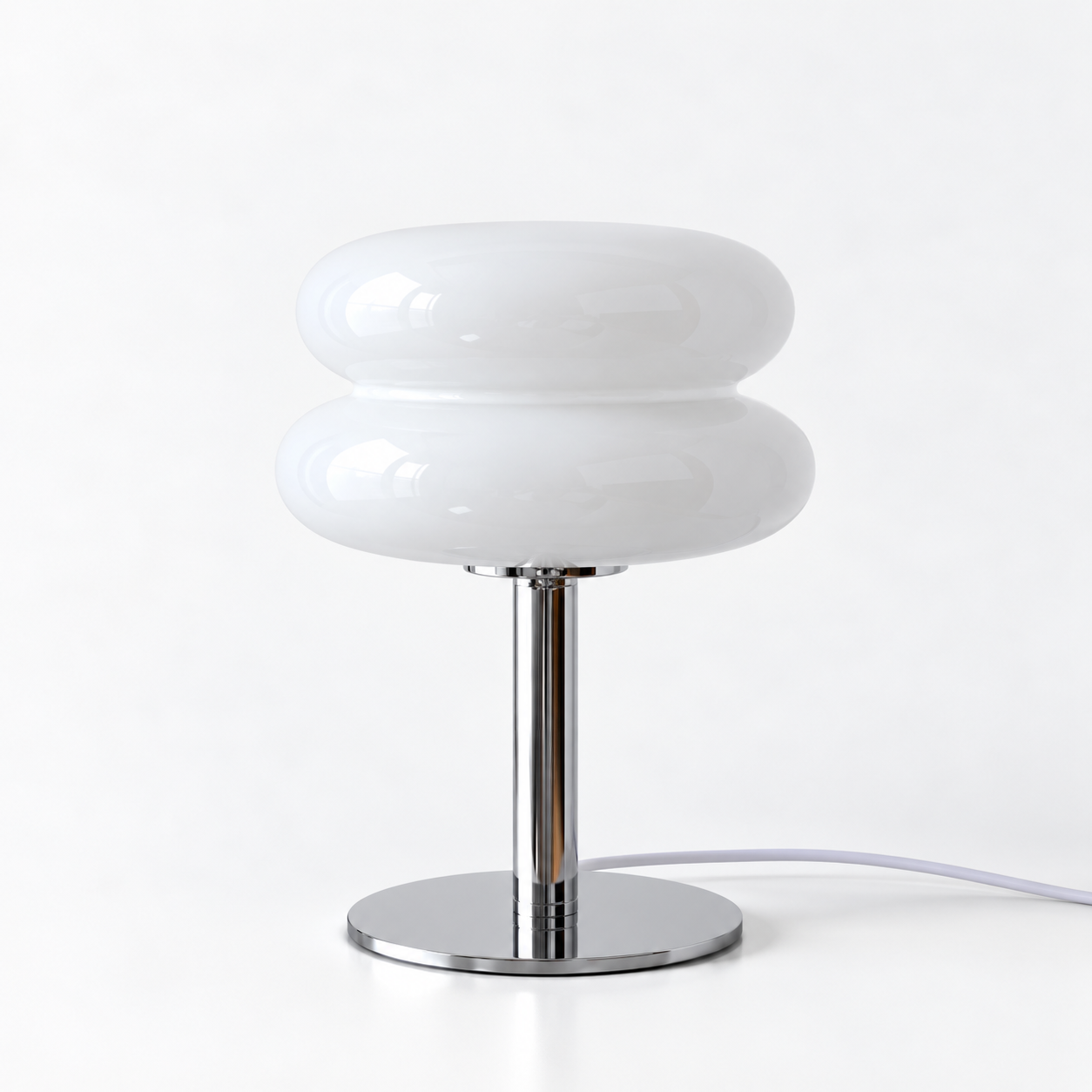Macaron Lamp in White, glossy stacked glass shade on a chrome base, shown against a plain backdrop
