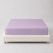 Mira Bamboo Fitted Sheet in Lavender, smooth bamboo fabric fitted snugly over a mattress base