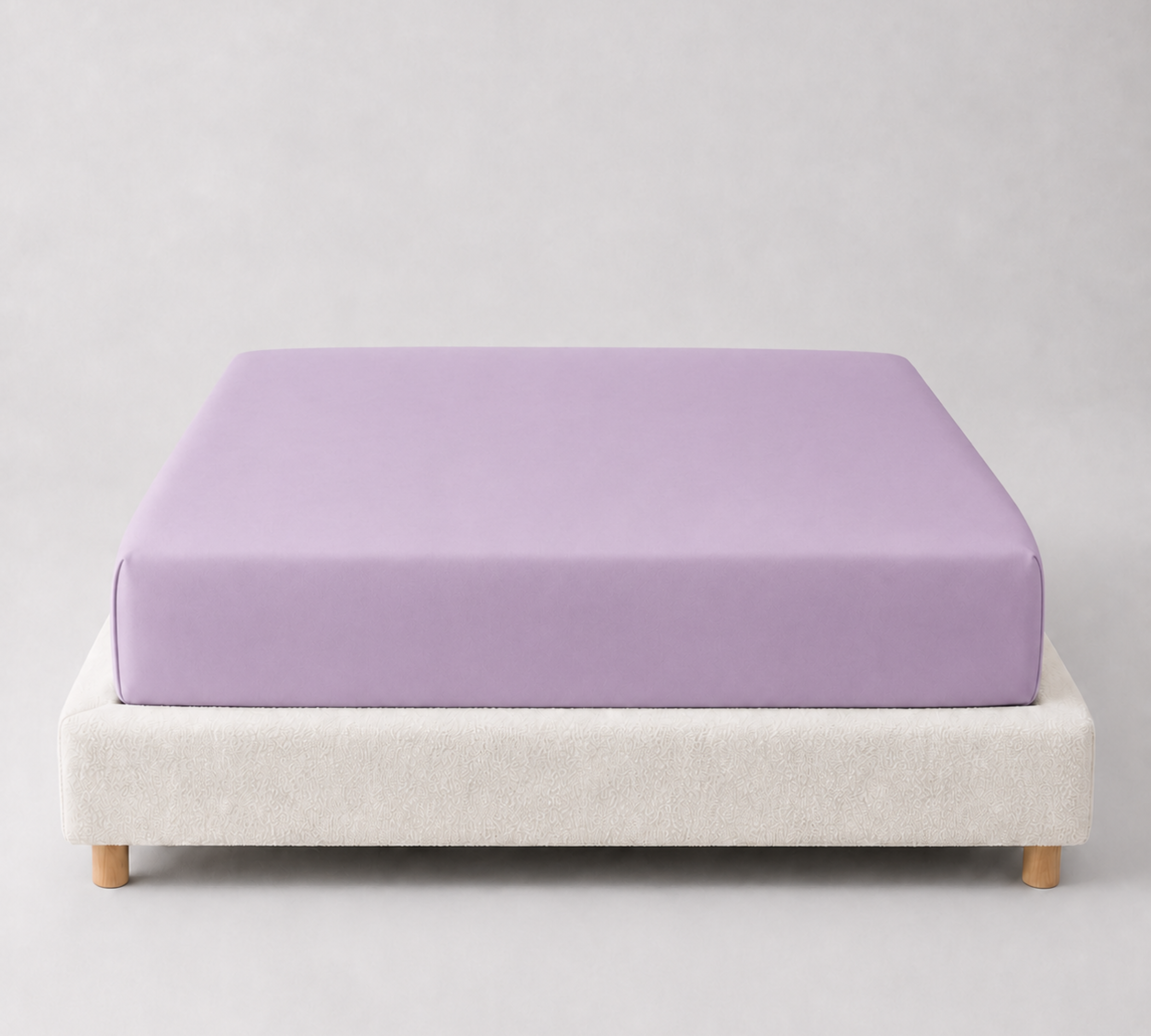 Mira Bamboo Fitted Sheet in Lavender, smooth bamboo fabric fitted snugly over a mattress base