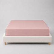 Mira Bamboo Fitted Sheet in Mauve, dusty pink fabric fitted snugly over a mattress base