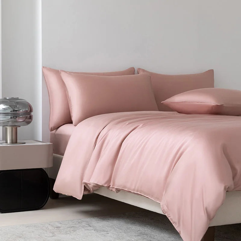 Soléa Bamboo Bedding Set in Premium Pink, sateen weave draped over a made bed with soft folds