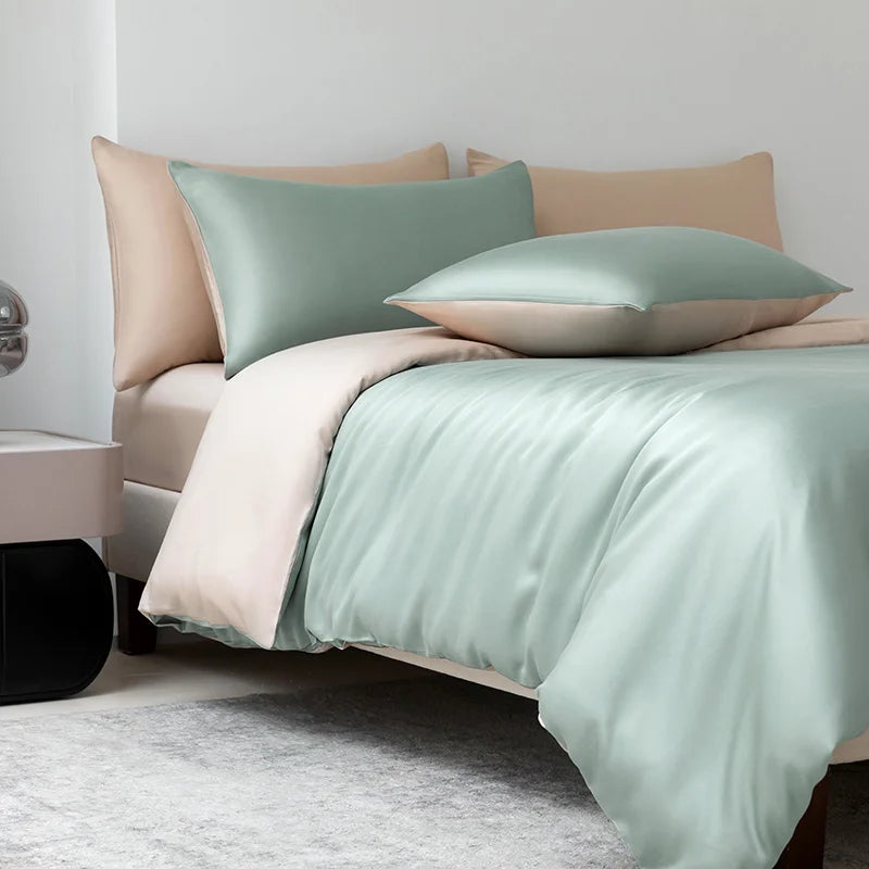 Soléa Bamboo Bedding Set in Spring Green - Gold, sage sateen with beige reverse on a made bed