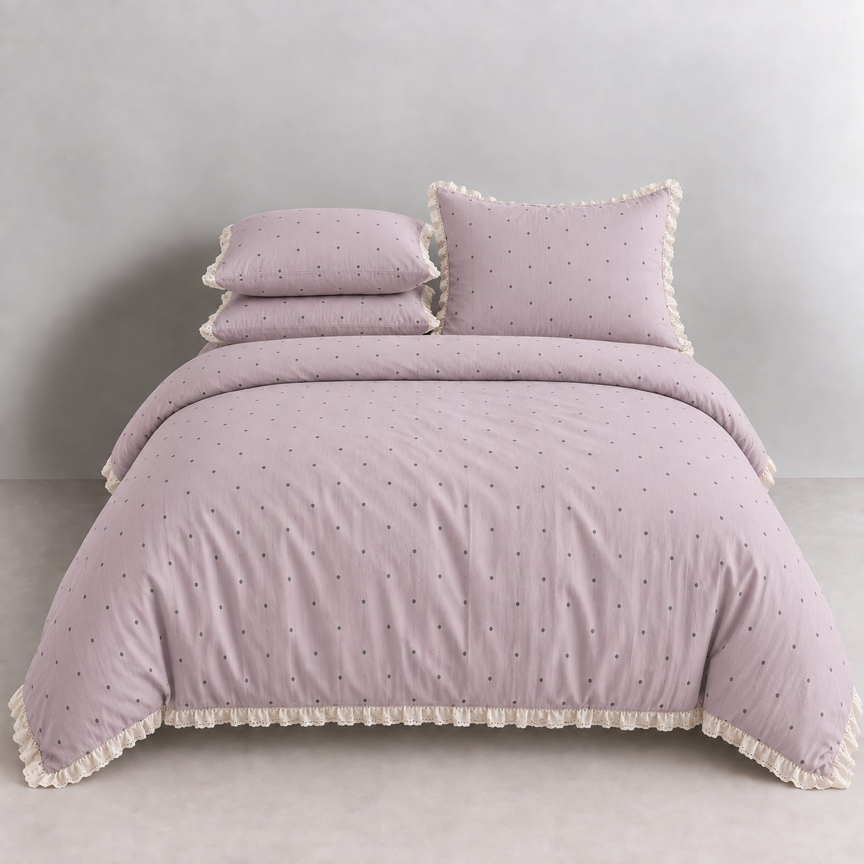 Sundae Spot Bedding Set in Lavender Polka, made bed with polka dots and gathered lace frill trim