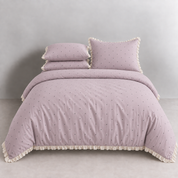 Sundae Spot Bedding Set in Lavender Polka, made bed with polka dots and gathered lace frill trim