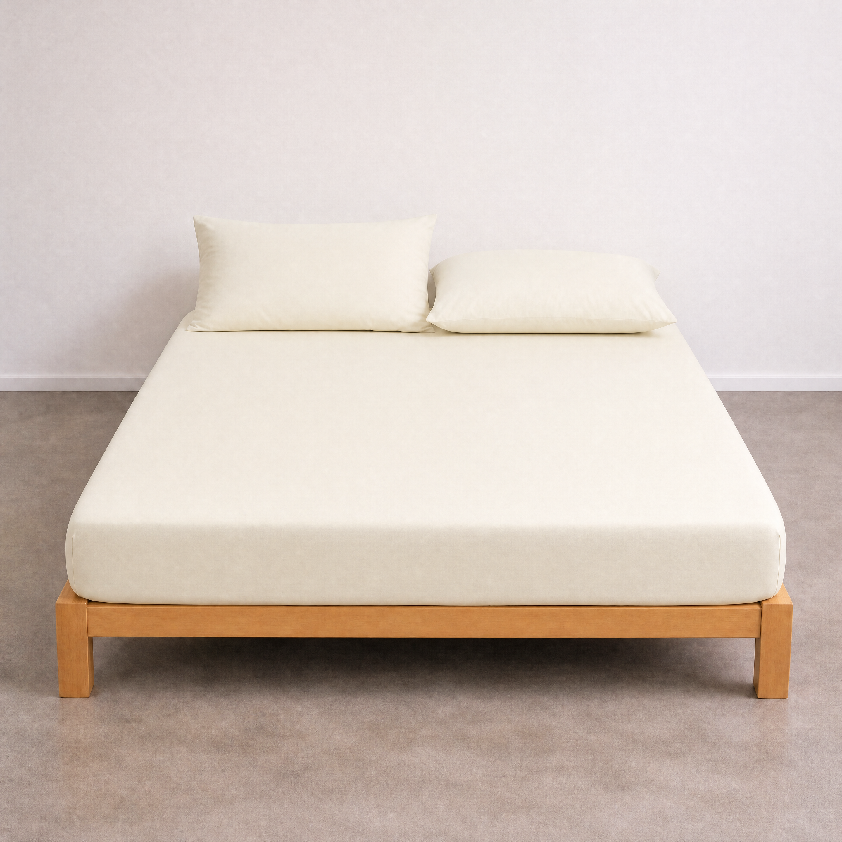 Tate Fitted Sheet in Beige, fitted smoothly over a mattress on a timber bed frame