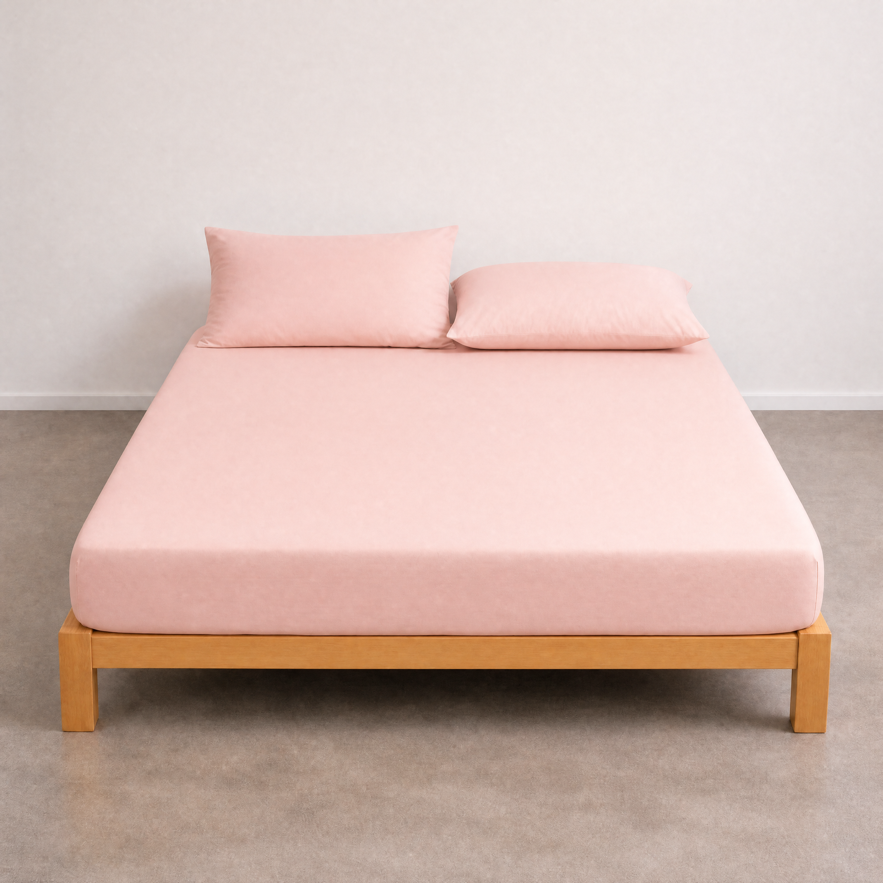 Tate Fitted Sheet in Light Pink dresses a timber bed frame, soft blush tone on a smooth twill weave