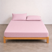 Tate Fitted Sheet in Pink on a timber bed frame, smooth twill weave with matching pillowcases