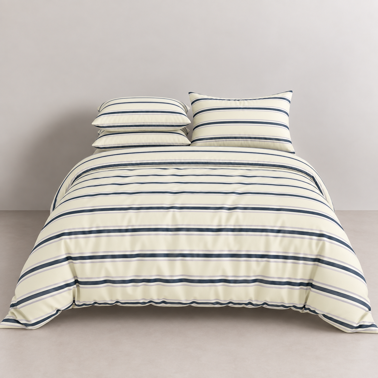 Vida Bedding Set in Cream & Blue, navy striped quilt cover and pillowcases on a made bed