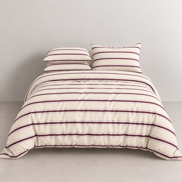 Vida Bedding Set in Cream & Cherry, cream quilt cover with burgundy stripes on a made bed